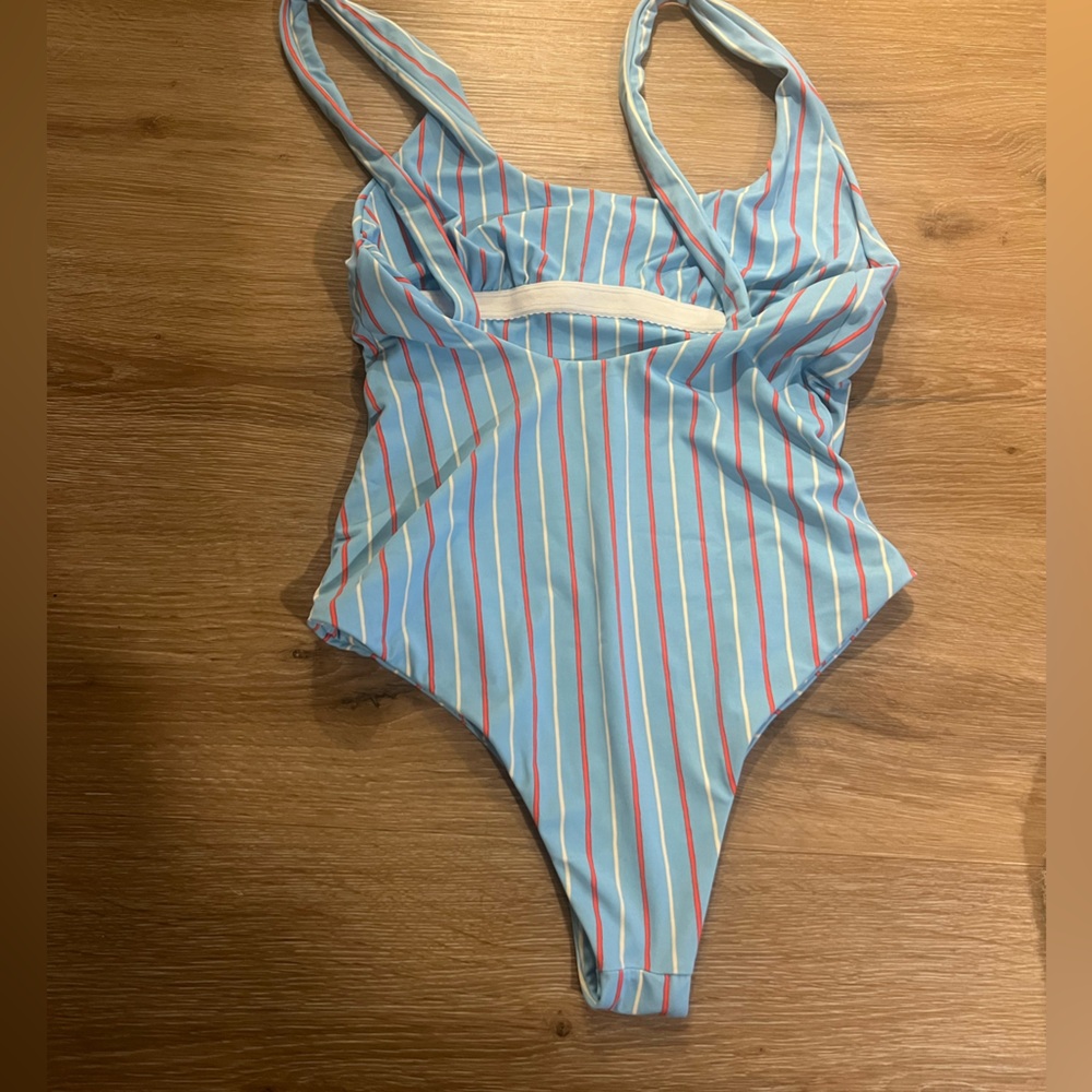 Boys + Arrows one piece. Size small. Adorable on.